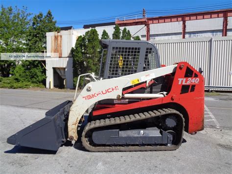 takeuchi track skid steer models